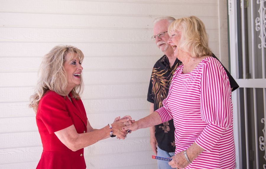 Jill Dickman talking with residents